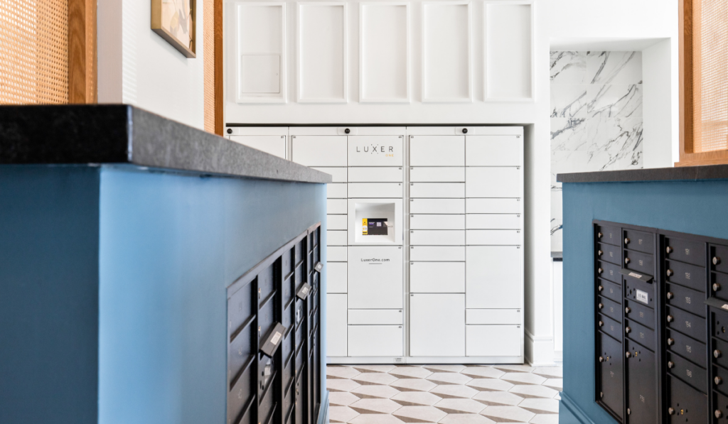 White Luxer One package lockers in community mail room