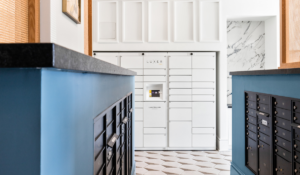 White Luxer One package lockers in community mail room