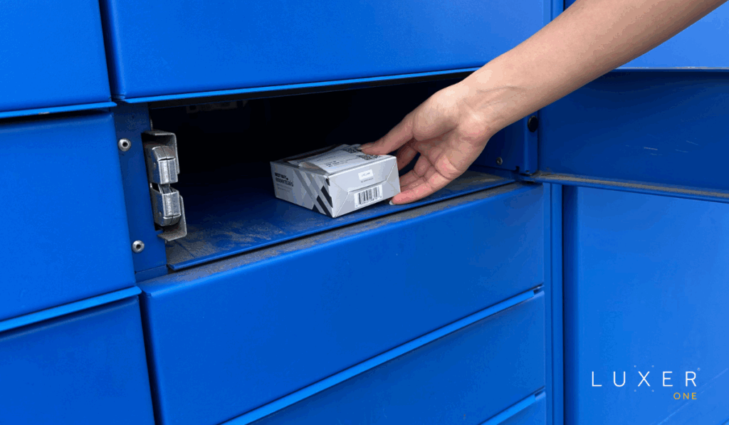 Shopper removing their online purchase from blue BOPIS lockers