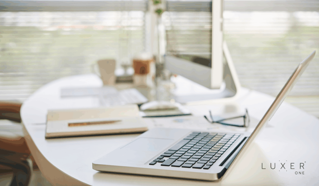 Open laptop on office desk in the workplace