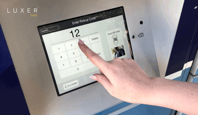 Resident using touchscreen to pickup package from Luxer One smart package lockers