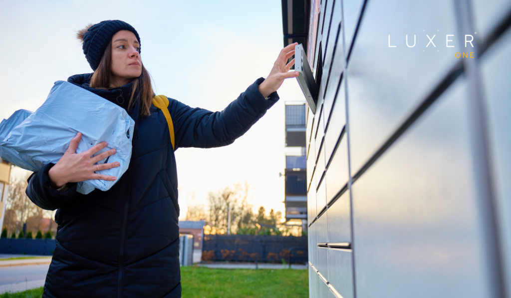 woman using smart package locker for delivery