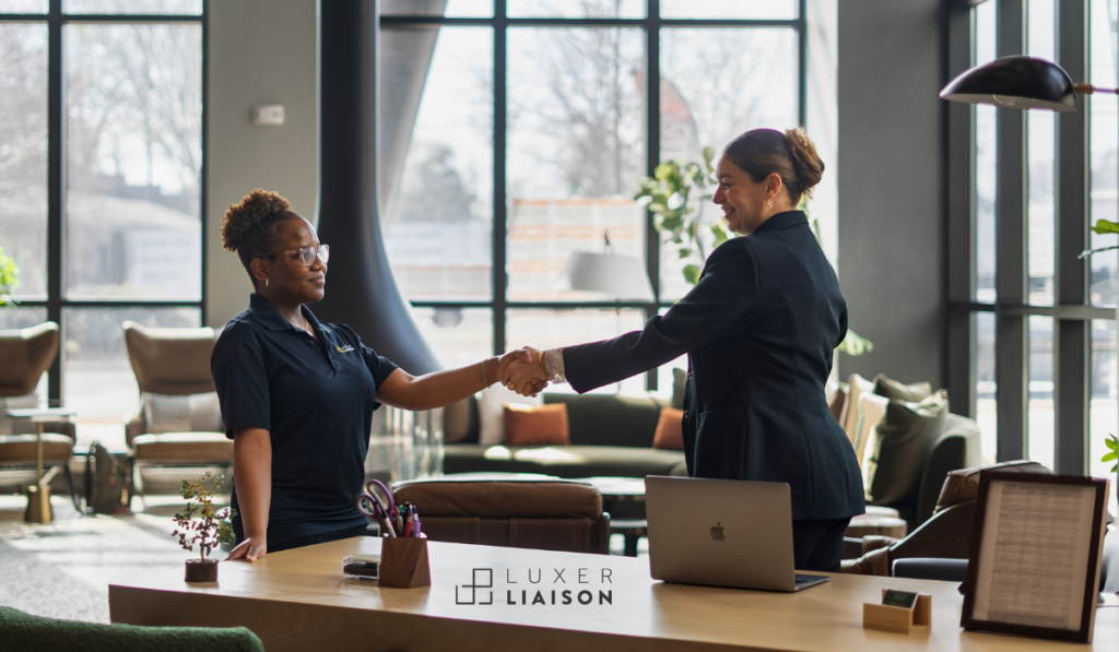Luxer Liaison shaking hands with property manager