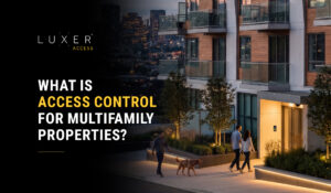 Modern multifamily apartment building with residents approaching a secure access-controlled entrance